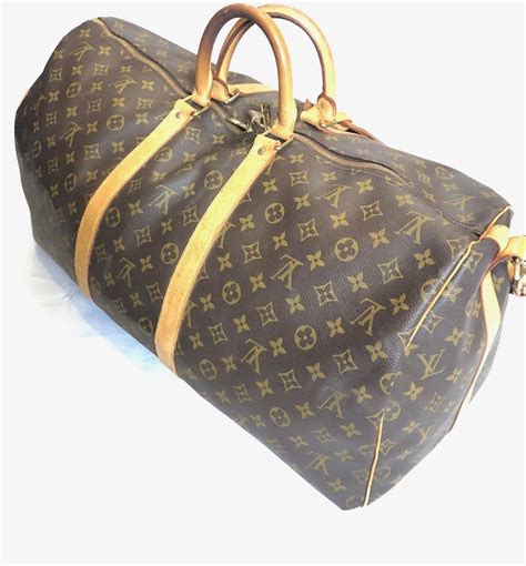 louis vuitton keepall bag fake|louis vuitton 55 duffle bag.